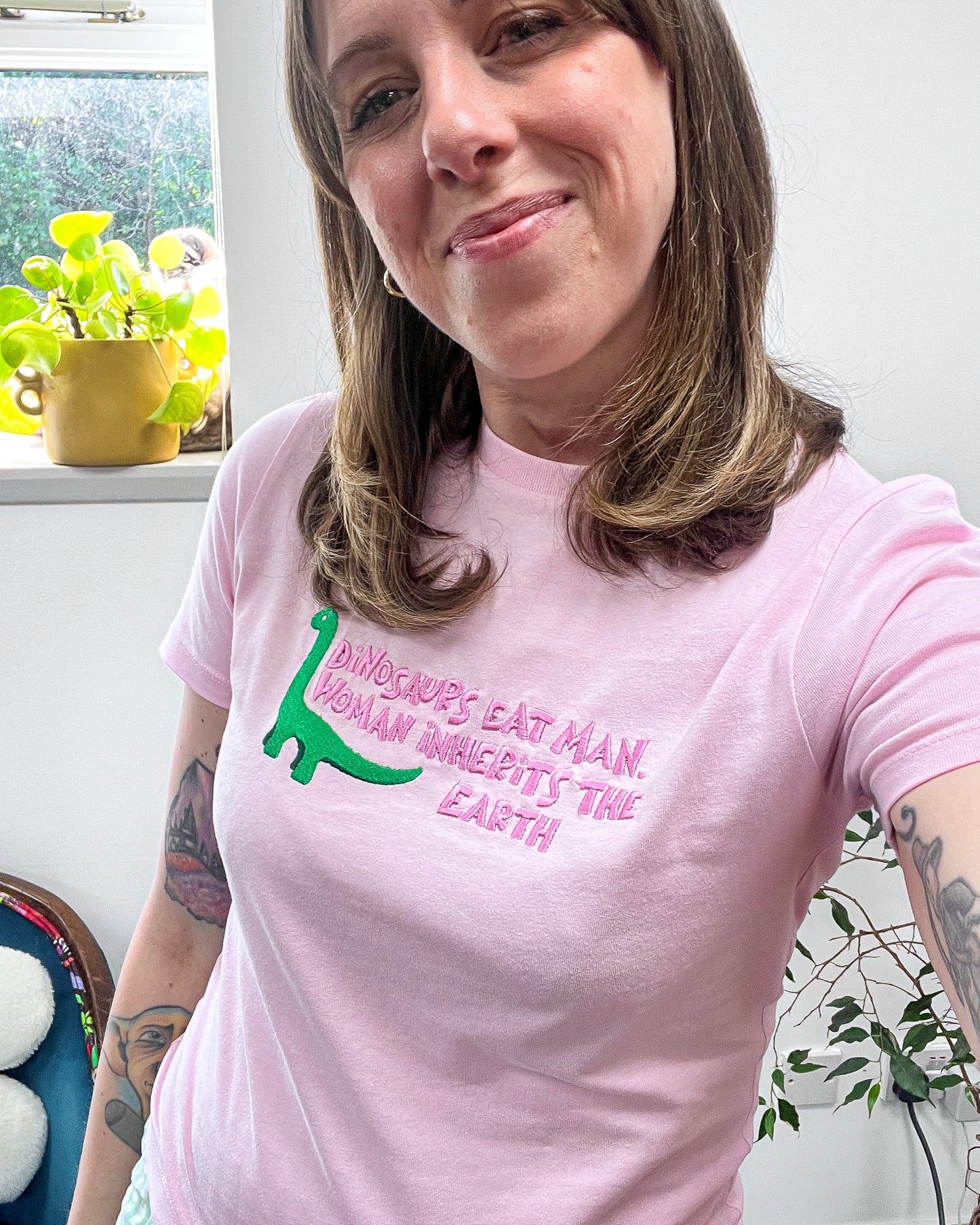 WOMAN INHERITS THE EARTH SHORTY TEE