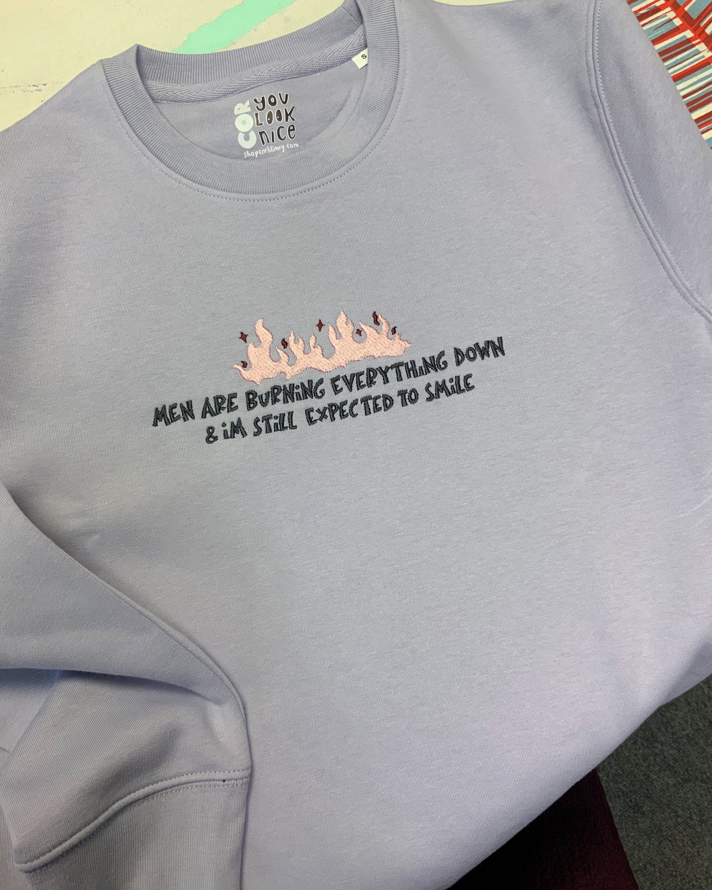 STILL EXPECTED TO SMILE SWEATER